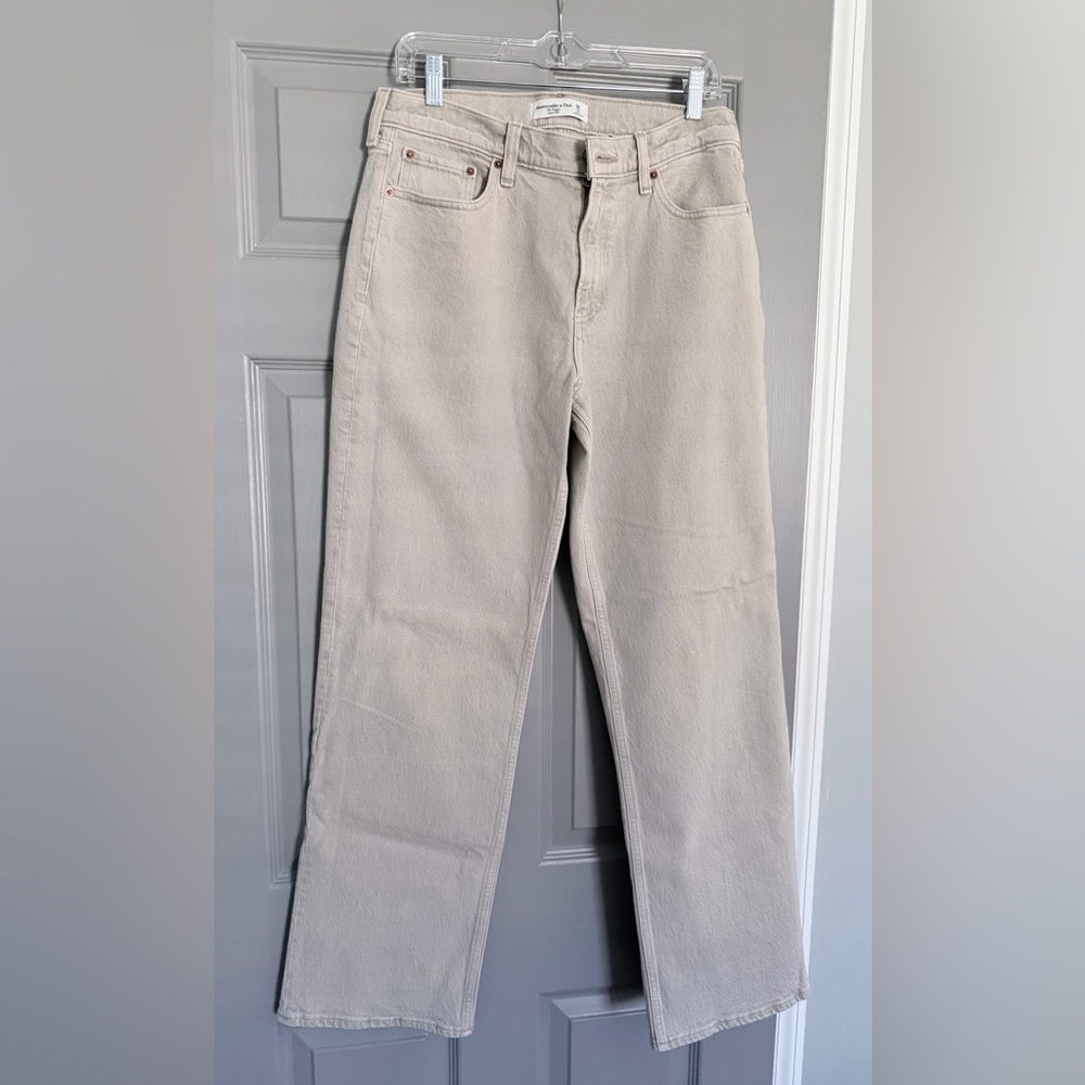 Abercrombie & Fitch, baggy fit jean, tan color, size 28 regular.
